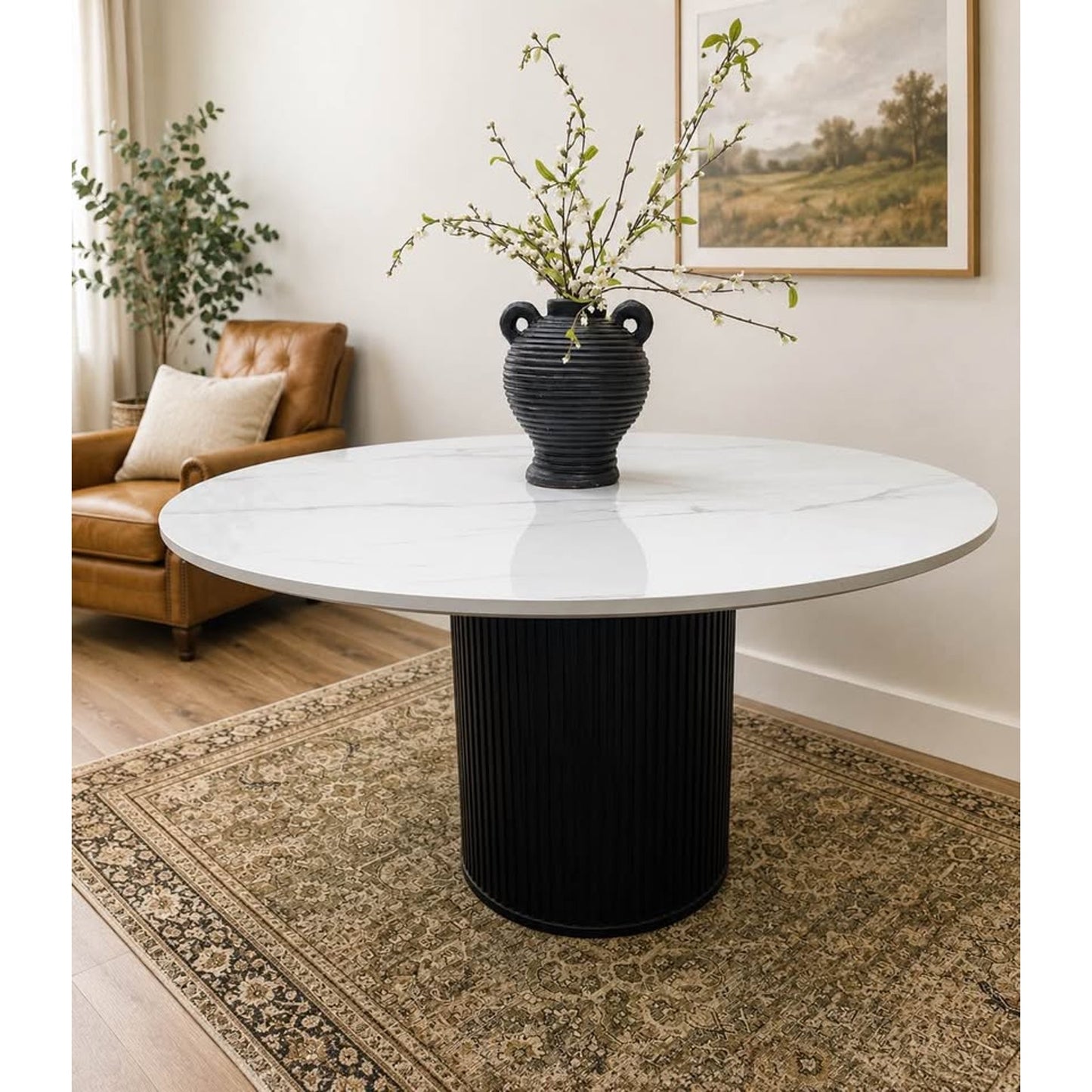 Colvin 54-Inch Round White Marble Table Black Ribbed Base By Steve Silver